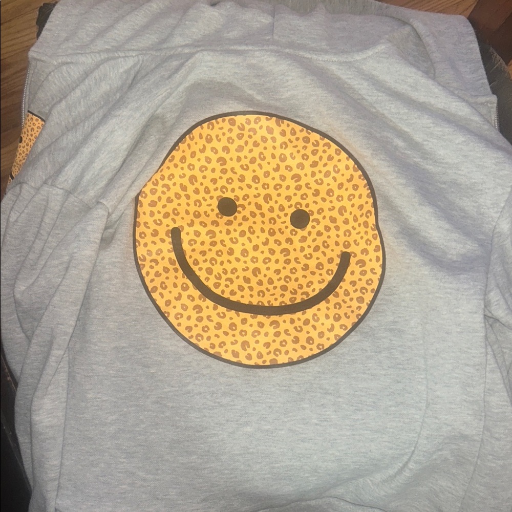 Gray Hoodie with Smiley Face Design